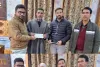 DC Kupwara Hands Over Compensation Cheques to Kin of Accident Victims