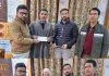 DC Kupwara Hands Over Compensation Cheques to Kin of Accident Victims